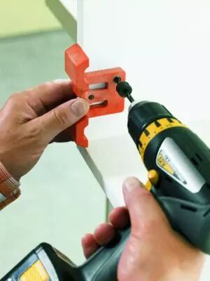 Gabarit de perage pour embase en croix