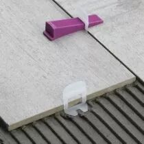Cale pour croisillons auto-nivelants